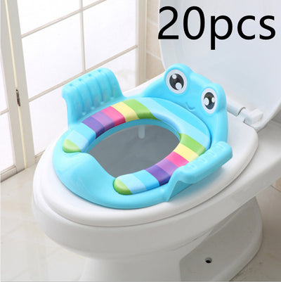Blue children potty training seat with handles featuring a frog design and colorful stripes on a white toilet