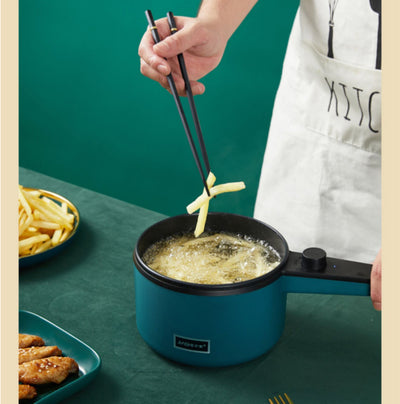Homeshinex blue mini electric cooking pot frying french fries with chopsticks on green table
