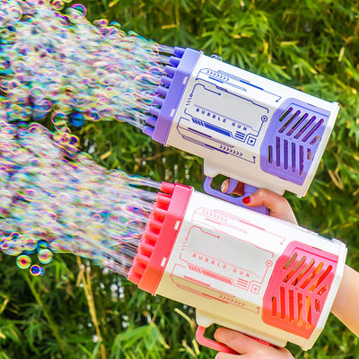 Homeshinex bubble machine rocket 69 holes in purple and pink blowing bubbles outdoors