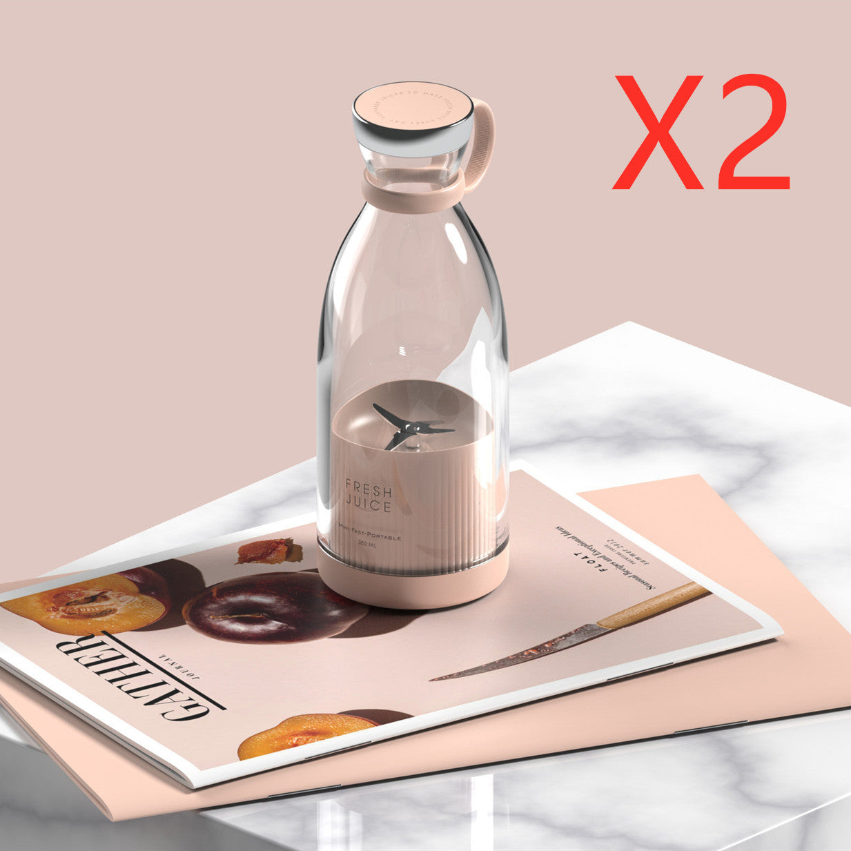Homeshinex portable electric juicer blender with clear body and beige base placed on magazines on marble table
