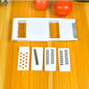 Homeshinex multifunctional kitchen grater with five interchangeable white blades on wooden surface