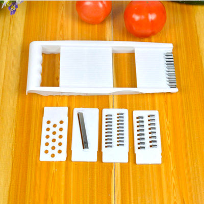 Homeshinex multifunctional kitchen grater with five interchangeable white blades on wooden surface
