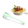 Homeshinex versatile kitchen spoon for pasta and eggs in light green next to a bowl of spaghetti